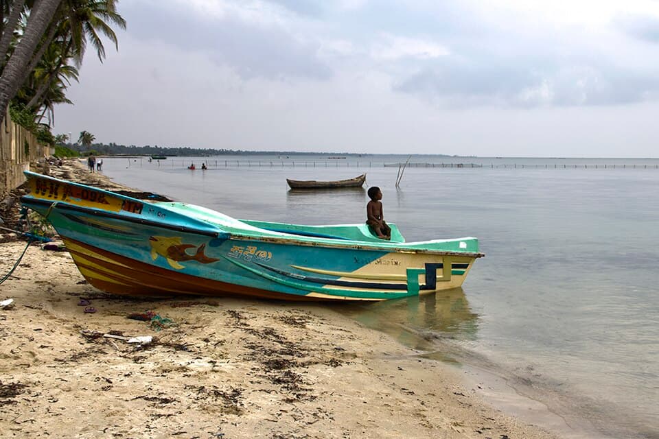 A fishing boat on the sand at Charty Beach, Velanai Island, near Jaffna