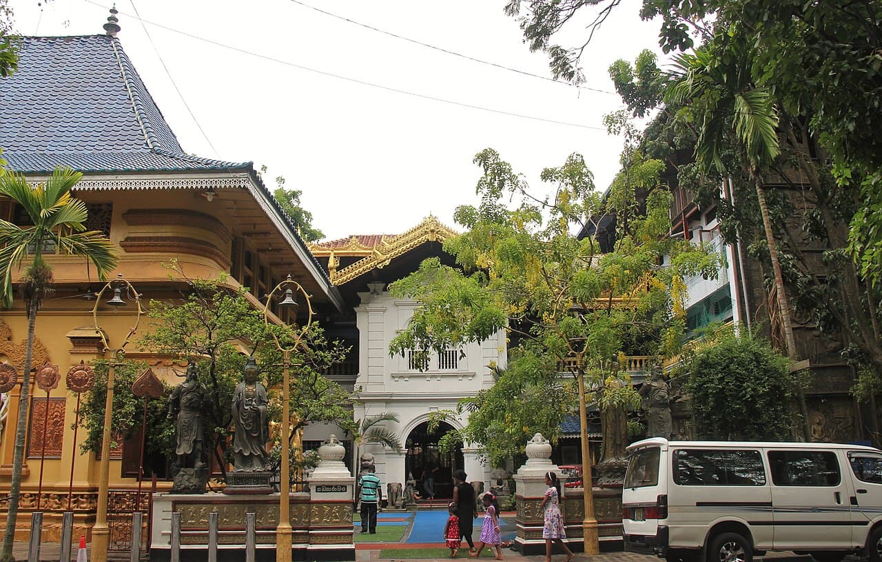 Seated Buddha statue at Gangaramaya Temple in Colombo