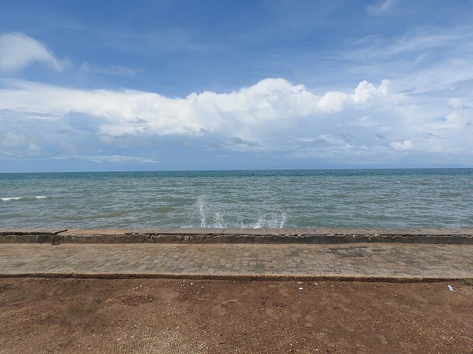 The sea wall at Keerimalai, where spring-fed bathing pools meet the ocean north of Jaffna