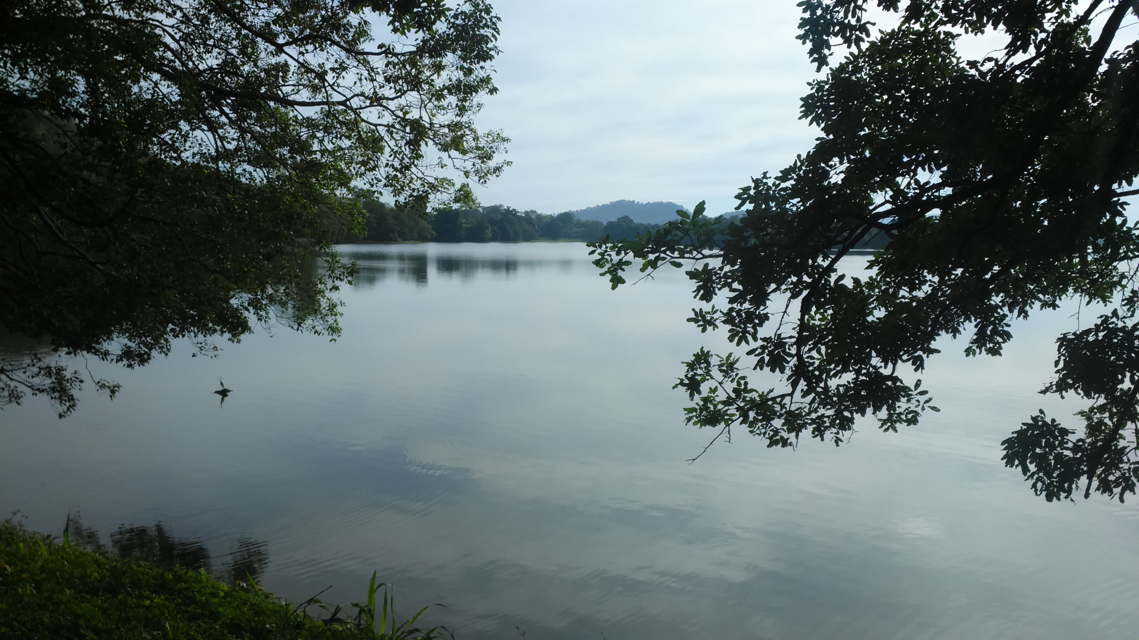 Sorabora Wewa reservoir surrounded by hills